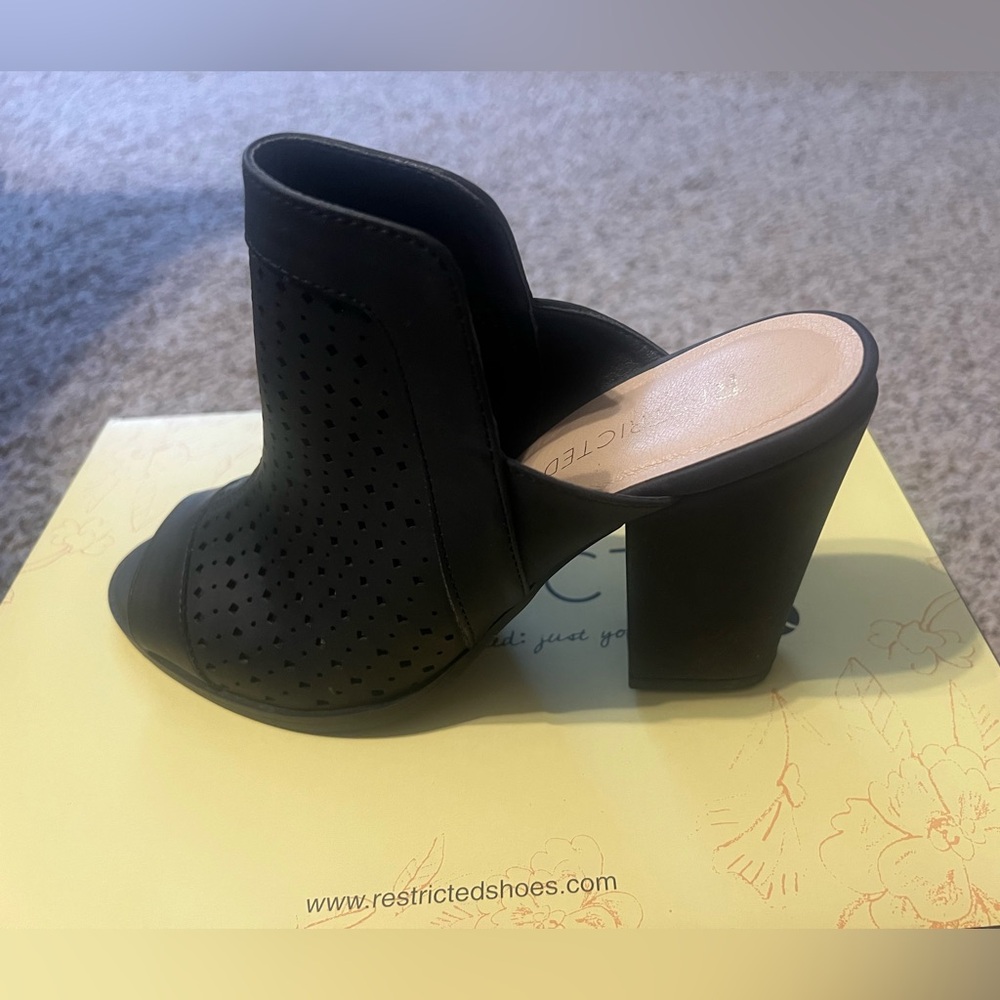 Restricted Perforated Black Mules